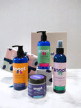 Load image into Gallery viewer, Gift set for pets, dogs and cats featuring a pet shampoo, pet conditioner, fragrance mist, and paw and nose butter
